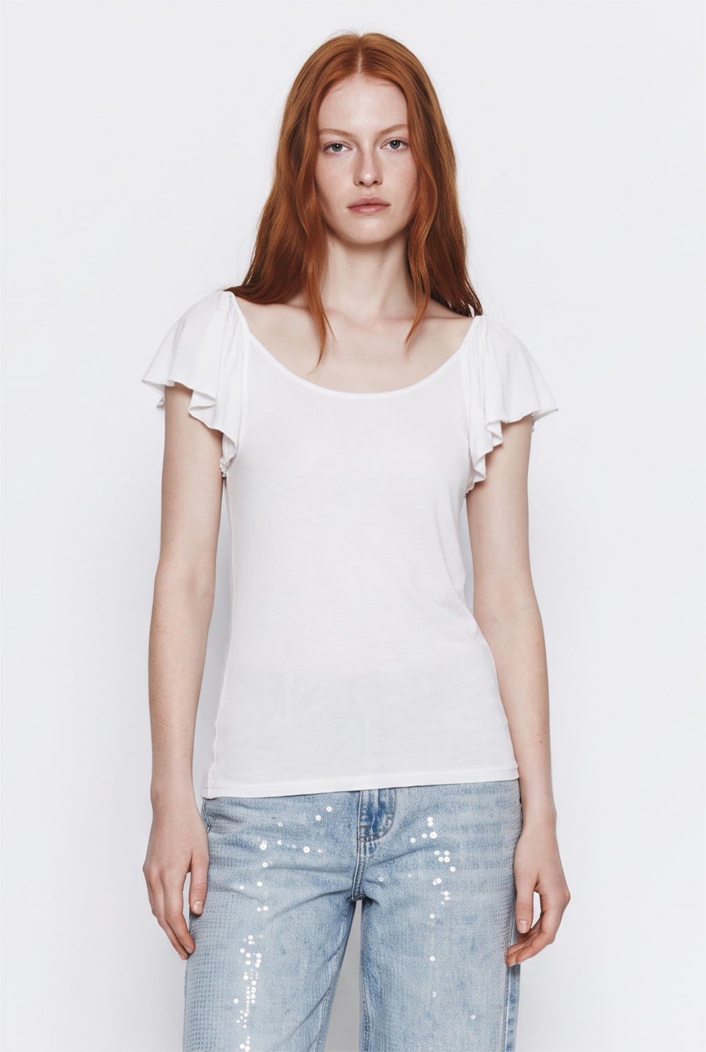 Polera de manga corta con volantes
